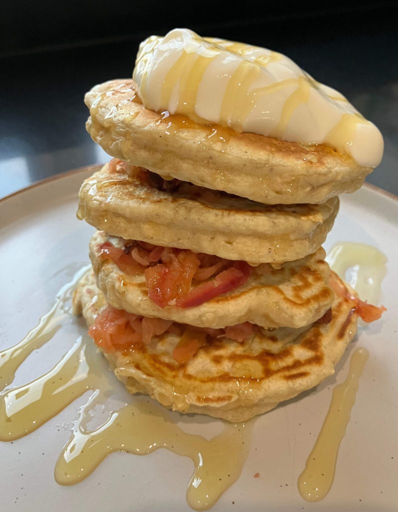 Spiced Pancakes with Apple drizzled with honey and a dollop of natural yoghurt on top.